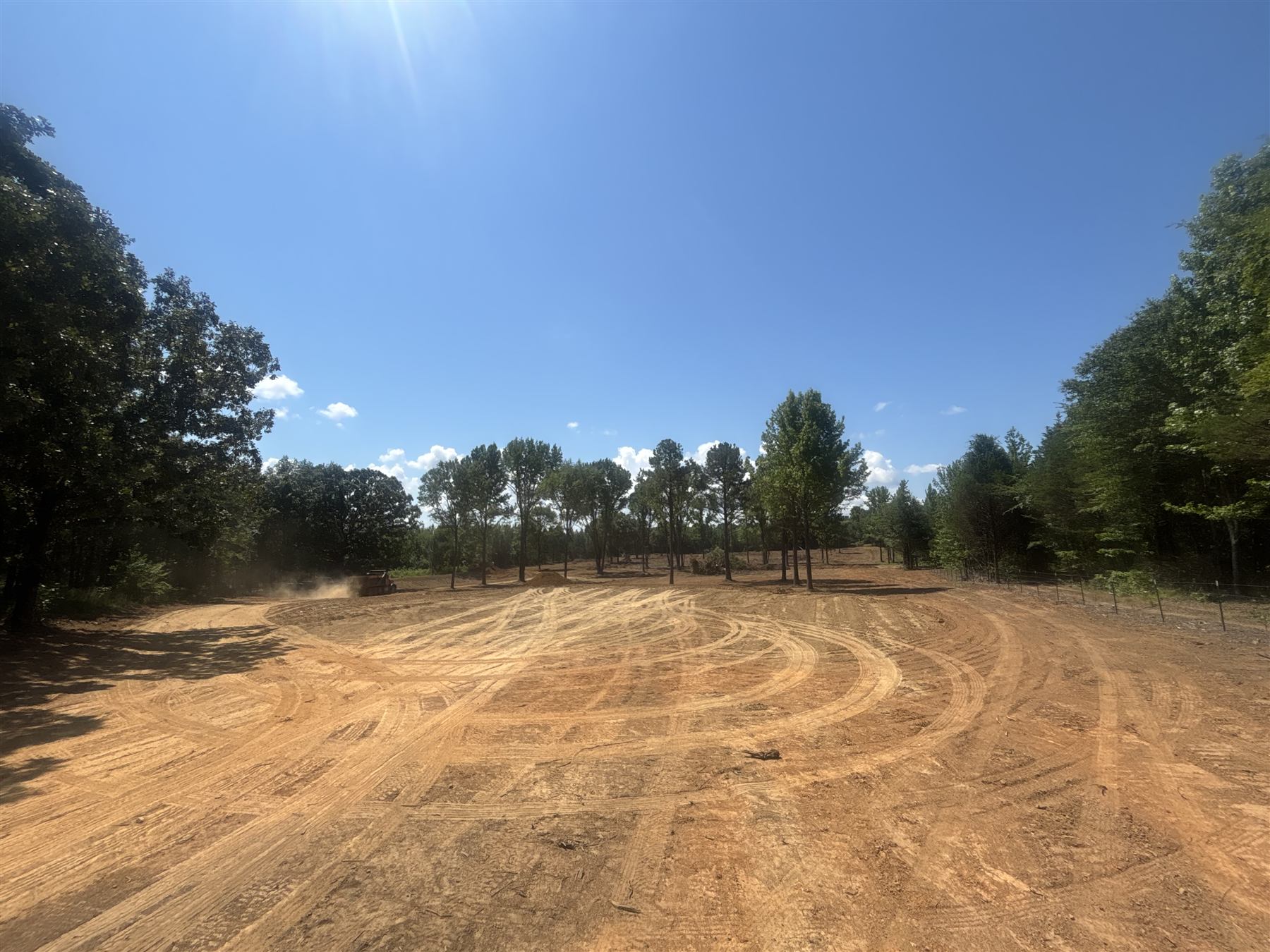 Freshly graded homesite pad by C&C Dirt Contractors